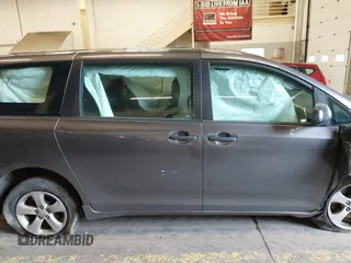 2015 Toyota Sienna L with VIN 5TDZK3DCXFS567507, listed as a IAAI auction lot 41205670 with 104,443 mi miles and . Bid and sale history available at DreamBid. Image 14.