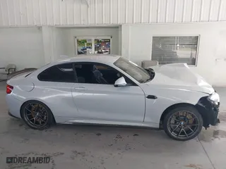 2020 BMW M2 Competition with VIN WBS2U7C01L7F87723, listed as a IAAI auction lot 40319156 with 55,309 mi miles. Bid and sale history available at carsss.com. Image 14.