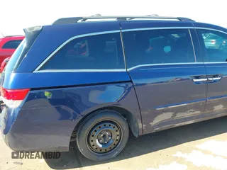 2016 Honda Odyssey Touring Elite with VIN 5FNRL5H98GB083221, listed as a IAAI auction lot 41626604 with 145,341 mi miles and . Bid and sale history available at DreamBid. Image 18.