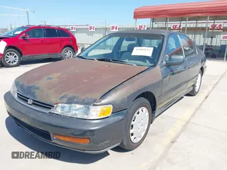 1996 Honda Accord LX with VIN 1HGCD5633TA286104, listed as a IAAI auction lot 42004112 with 186,586 mi miles and . Bid and sale history available at carsss.com. Image 17.