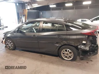 2021 Toyota Prius LE with VIN JTDKAMFP8M3175487, listed as a IAAI auction lot 42176936 with 78,153 mi miles and . Bid and sale history available at DreamBid. Image 14.