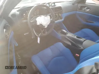 2024 Nissan Z Performance с VIN JN1BZ4BH3RM366584, выставлен на аукционе Copart как лот 49207535 с пробегом 4 936 миль миль и Списание • Salvage title. История ставок и продаж доступна на DreamBid. Изображение 8.