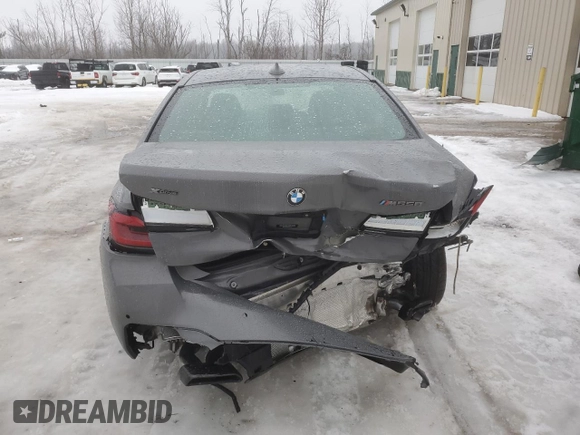 2021 BMW 5 Series M550i xDrive z VIN WBA13BK05MCF97316, wystawiony jako Copart lot #63713144 z przebiegiem Nie podano mil oraz Szkoda całkowita • Salvage title. Historia ofert i sprzedaży dostępna na DreamBid. Obrazek 6.