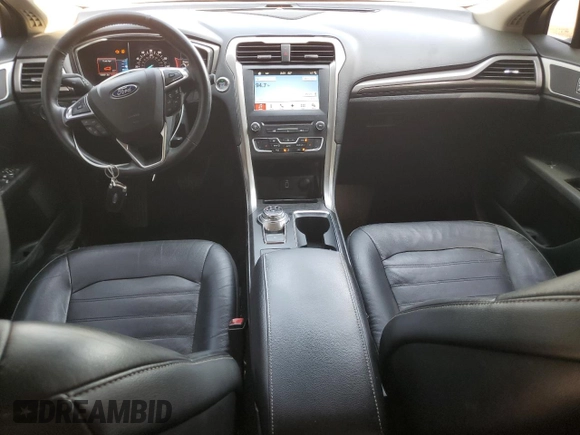 2017 Ford Fusion SE z VIN 3FA6P0H98HR328552, wystawiony jako Copart lot #52709395 z przebiegiem 188 451 mil mil oraz Szkoda całkowita • Salvage title. Historia ofert i sprzedaży dostępna na DreamBid. Obrazek 8.
