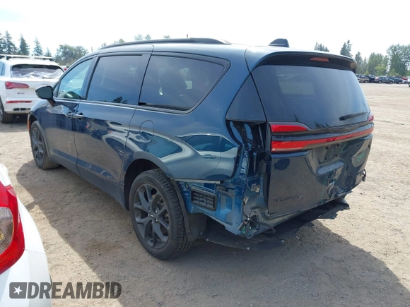 2023 Chrysler Pacifica Limited with VIN 2C4RC3GGXPR555282, listed as a IAAI auction lot 42452848 with 18,373 mi miles and . Bid and sale history available at DreamBid. Image 3.