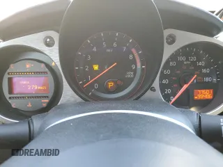 2014 Nissan 370Z Touring with VIN JN1AZ4EH1EM635411, listed as a Copart auction lot 82670344 with 77,501 mi miles and Salvage Title. Bid and sale history available at carsss.com. Image 9.