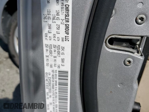 2012 Dodge Journey SXT z VIN 3C4PDDBG0CT293331, wystawiony jako Copart lot #62602995 z przebiegiem 185 605 mil mil oraz Szkoda całkowita • Salvage title. Historia ofert i sprzedaży dostępna na DreamBid. Obrazek 13.