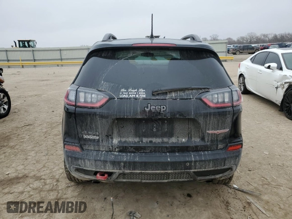 2020 Jeep Cherokee Trailhawk z VIN 1C4PJMBN6LD518073, wystawiony jako Copart lot #43611095 z przebiegiem 39 947 mil mil oraz Szkoda całkowita • Salvage title. Historia ofert i sprzedaży dostępna na DreamBid. Obrazek 6.