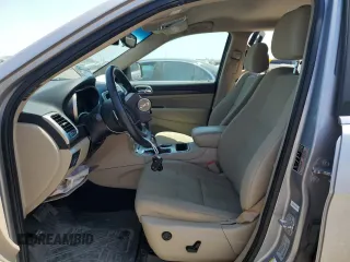 2017 Jeep Grand Cherokee Laredo with VIN 1C4RJEAG0HC816410, listed as a Copart auction lot 52909905 with 102,326 mi miles and Salvage title. Bid and sale history available at DreamBid. Image 7.