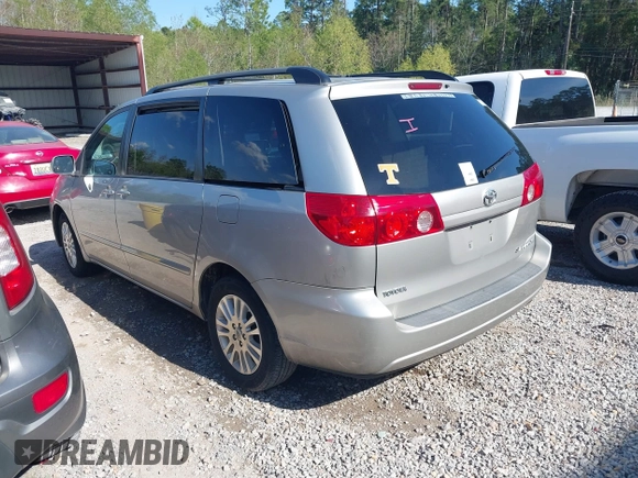 2010 Toyota Sienna XLE with VIN 5TDYK4CC9AS319809, listed as a IAAI auction lot 41885905 with 252,010 mi miles and . Bid and sale history available at DreamBid. Image 3.