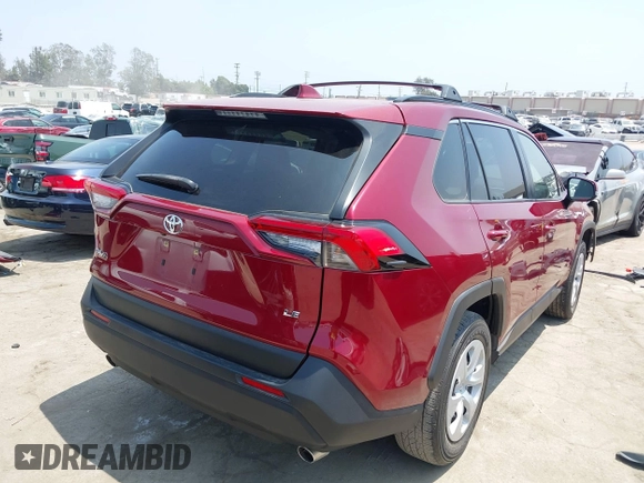 2019 Toyota RAV4 LE with VIN JTMK1RFV4KD025587, listed as a IAAI auction lot 42459046 with 73,852 mi miles and . Bid and sale history available at DreamBid. Image 4.