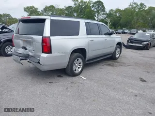 2019 Chevrolet Suburban LT with VIN 1GNSCHKC6KR372891, listed as a IAAI auction lot 41870878 with 92,161 mi miles. Bid and sale history available at carsss.com. Image 4.