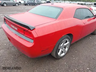 2011 Dodge Challenger with VIN 2B3CJ4DG2BH557162, listed as a IAAI auction lot 41977762 with 256,629 mi miles. Bid and sale history available at carsss.com. Image 4.