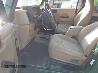 2001 Jeep Wrangler Sport with VIN 1J4FA49S71P315061, listed as a IAAI auction lot 41525441 with 178,809 mi miles. Bid and sale history available at carsss.com. Image 5.