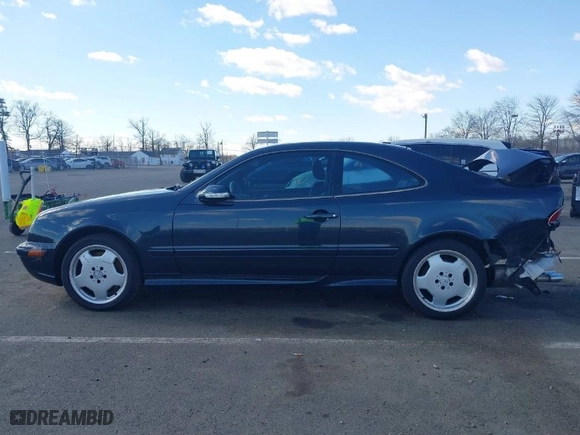 2002 Mercedes-Benz CLK-Class AMG with VIN WDBLJ74GX2T106286, listed as a IAAI auction lot 41737170 with 136,170 mi miles. Bid and sale history available at carsss.com. Image 14.