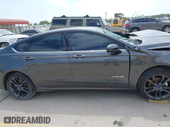 2018 Ford Fusion Hybrid SE with VIN 3FA6P0LU1JR116139, listed as a IAAI auction lot 41933594 with 83,000 mi miles. Bid and sale history available at carsss.com. Image 14.