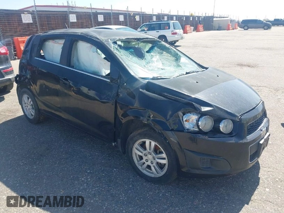 2012 Chevrolet Sonic LT with VIN 1G1JC6SB9C4200197, listed as a IAAI auction lot 42085421 with 124,667 mi miles. Bid and sale history available at carsss.com. Image 1.