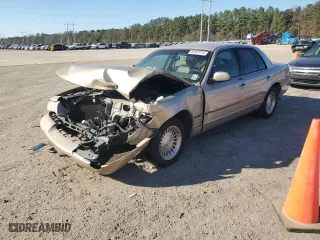 1998 Mercury Grand Marquis LS with VIN 2MEFM75W6WX651436, listed as a Copart auction lot 86367414 with 135,380 mi miles and Salvage Title. Bid and sale history available at carsss.com. Image 1.