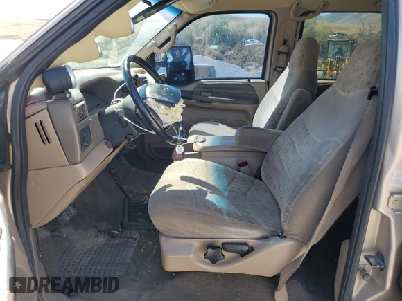 1999 Ford F-350 XL with VIN 1FTSW31S0XEC29624, listed as a Copart auction lot 70879344 with 151,680 mi miles and Salvage title. Bid and sale history available at DreamBid. Image 7.