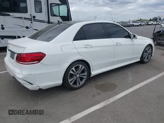 2015 Mercedes-Benz E 350 Sport with VIN WDDHF5KB1FB145337, listed as a IAAI auction lot 42137791 with 104,713 mi miles and . Bid and sale history available at DreamBid. Image 4.