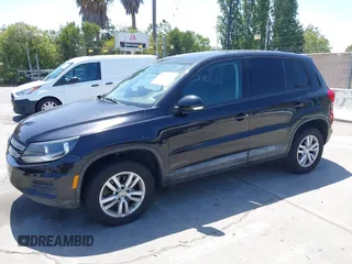 2013 Volkswagen Tiguan SE with VIN WVGAV7AXXDW542019, listed as a IAAI auction lot 42482696 with 193,383 mi miles and . Bid and sale history available at DreamBid. Image 2.