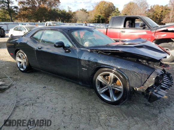 2015 Dodge Challenger R/T with VIN 2C3CDZAT1FH823432, listed as a Copart auction lot 77883964 with 126,929 mi miles and Salvage title. Bid and sale history available at DreamBid. Image 4.