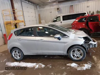 2019 Ford Fiesta SE with VIN 3FADP4EJ8KM142043, listed as a IAAI auction lot 41592365 with 55,005 mi miles and . Bid and sale history available at carsss.com. Image 13.