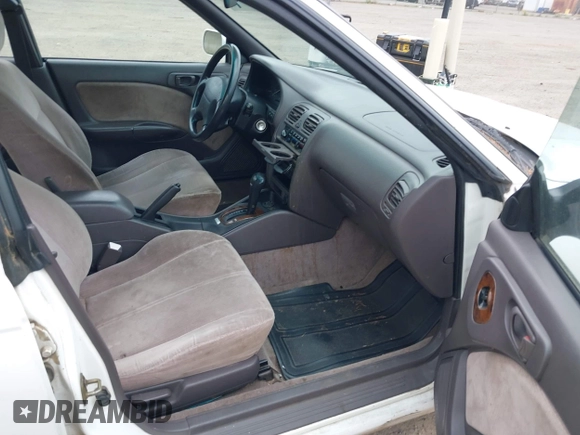 1996 Subaru Legacy with VIN 4S3BD4559T7202906, listed as a IAAI auction lot 42214410 with 211,118 mi miles and . Bid and sale history available at DreamBid. Image 5.