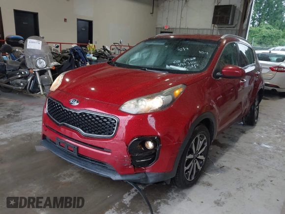 2017 Kia Sportage EX with VIN KNDPN3AC5H7033928, listed as a IAAI auction lot 42241460 with 86,900 mi miles and . Bid and sale history available at DreamBid. Image 2.