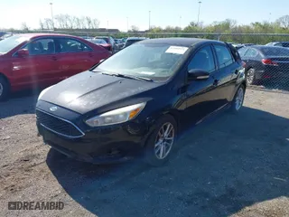 2015 Ford Focus SE with VIN 1FADP3K28FL214566, listed as a IAAI auction lot 42044521 with 172,289 mi miles. Bid and sale history available at carsss.com. Image 2.