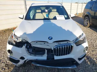 2018 BMW X1 sDrive28i with VIN WBXHU7C36J5H41267, listed as a IAAI auction lot 41270207 with 84,726 mi miles. Bid and sale history available at carsss.com. Image 12.