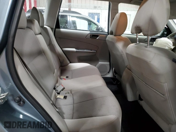 2011 Subaru Forester X z VIN JF2SHABC7BH747289, wystawiony jako Copart lot #57037115 z przebiegiem 85 324 mil mil oraz Szkoda całkowita • Salvage title. Historia ofert i sprzedaży dostępna na DreamBid. Obrazek 11.