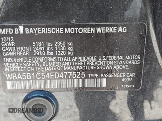 2014 BMW 5 Series 535i with VIN WBA5B1C54ED477525, listed as a IAAI auction lot 41692887 with 122,288 mi miles. Bid and sale history available at carsss.com. Image 9.