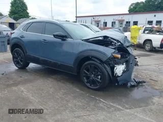2024 Mazda CX-30 S Preferred with VIN 3MVDMBCM3RM641653, listed as a IAAI auction lot 42374613 with 9,410 mi miles and . Bid and sale history available at DreamBid. Image 1.