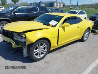 2015 Chevrolet Camaro LS z VIN 2G1FB1E36F9249133, wystawiony jako IAAI lot #42026600 z przebiegiem 63 300 mil mil oraz . Historia ofert i sprzedaży dostępna na DreamBid. Obrazek 18.