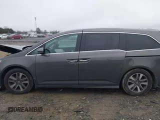 2015 Honda Odyssey Touring Elite with VIN 5FNRL5H92FB089627, listed as a IAAI auction lot 41115013 with Not Provided miles and . Bid and sale history available at DreamBid. Image 14.