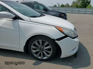 2012 Hyundai Sonata Limited z VIN 5NPEC4AB2CH490212, wystawiony jako Copart lot #59576655 z przebiegiem 144 183 mil mil oraz Szkoda całkowita • Salvage title. Historia ofert i sprzedaży dostępna na DreamBid. Obrazek 13.