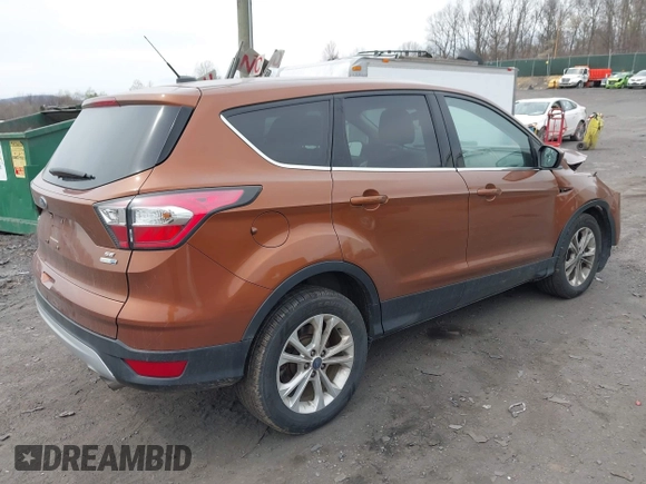 2017 Ford Escape SE with VIN 1FMCU9GD5HUA57132, listed as a IAAI auction lot 42075470 with 106,271 mi miles. Bid and sale history available at carsss.com. Image 4.