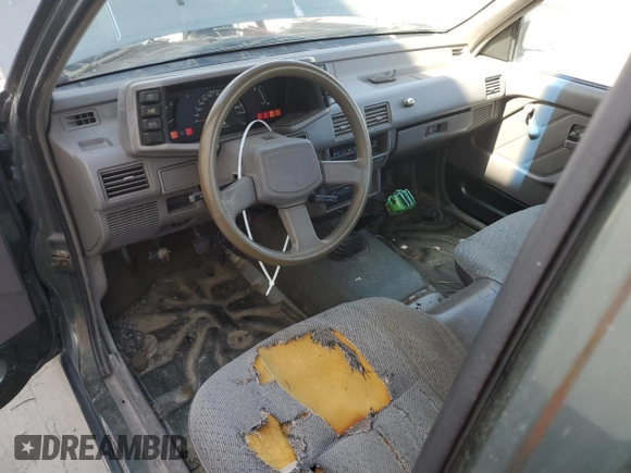 1994 Isuzu Pickup S z VIN JAACL11L2R7221226, wystawiony jako Copart lot #59027295 z przebiegiem 129 494 mil mil oraz Tytuł czysty. Historia ofert i sprzedaży dostępna na DreamBid. Obrazek 8.
