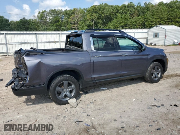2022 Honda Ridgeline RTL-E with VIN 5FPYK3F72NB000908, listed as a Copart auction lot 65631535 with 35,796 mi miles and Salvage title. Bid and sale history available at DreamBid. Image 3.