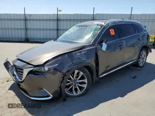 2018 Mazda CX-9 Grand Touring with VIN JM3TCADY5J0200052, listed as a Copart auction lot 55160715 with 68,464 mi miles and Salvage title. Bid and sale history available at DreamBid. Image 1.
