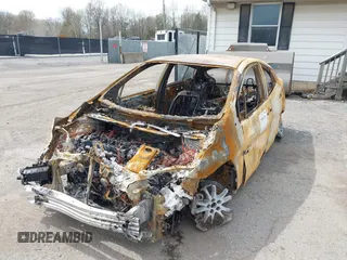 2021 Toyota Prius LE with VIN JTDKAMFPXM3180612, listed as a IAAI auction lot 39151391 with Not Provided miles and . Bid and sale history available at DreamBid. Image 6.