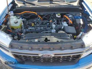 2022 Ford Maverick XL z VIN 3FTTW8E31NRA63029, wystawiony jako Copart lot #52564685 z przebiegiem 21 204 mil mil oraz Szkoda całkowita • Salvage title. Historia ofert i sprzedaży dostępna na DreamBid. Obrazek 11.