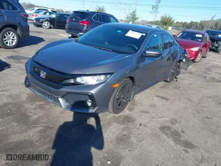 2017 Honda Civic Hatchback EX-L Navi with VIN SHHFK7H79HU208310, listed as a IAAI auction lot 41362349 with 52,740 mi miles. Bid and sale history available at carsss.com. Image 17.