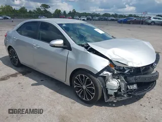 2014 Toyota Corolla L with VIN 5YFBURHE9EP160912, listed as a IAAI auction lot 42159372 with 125,863 mi miles and . Bid and sale history available at DreamBid. Image 1.