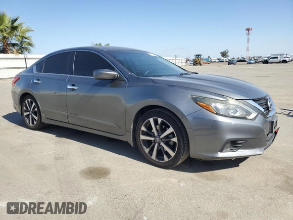 2016 Nissan Altima SR z VIN 1N4AL3AP5GC209029, wystawiony jako Copart lot #55973955 z przebiegiem 131 909 mil mil oraz Szkoda całkowita • Salvage title. Historia ofert i sprzedaży dostępna na DreamBid. Obrazek 4.