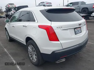 2019 Cadillac XT5 Luxury FWD with VIN 1GYKNCRS2KZ158560, listed as a IAAI auction lot 42067397 with 48,816 mi miles and . Bid and sale history available at DreamBid. Image 3.
