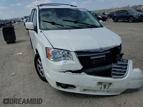 2010 Chrysler Town & Country Touring with VIN 2A4RR5D14AR260321, listed as a Copart auction lot 52700615 with 214,498 mi miles and Salvage Title. Bid and sale history available at DreamBid. Image 12.