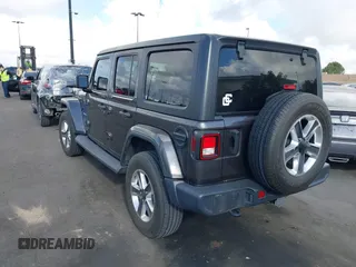 2021 Jeep Wrangler Unlimited Sahara with VIN 1C4HJXEN4MW503014, listed as a IAAI auction lot 41900234 with 16,444 mi miles and . Bid and sale history available at DreamBid. Image 3.