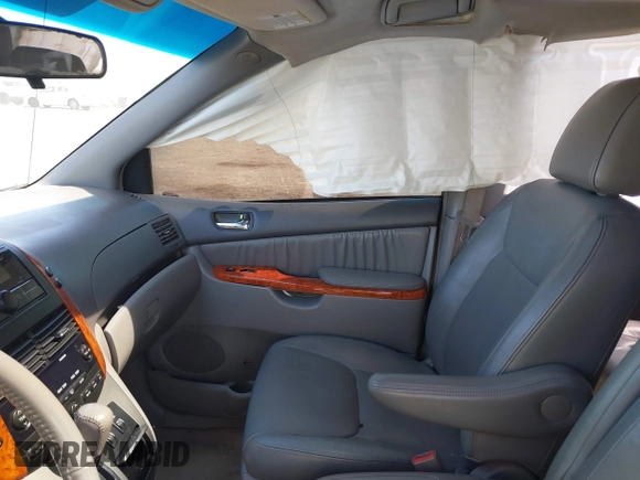 2009 Toyota Sienna XLE with VIN 5TDBK22C69S027767, listed as a IAAI auction lot 42029832 with 200,752 mi miles and . Bid and sale history available at DreamBid. Image 5.